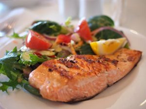 Salmon salad on a plate as part of a healthy diet
