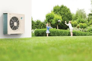 Air Source Heat Pump attached to the back of a domestic property which can make you eligible for the Renewable Heat Incentive Scotland